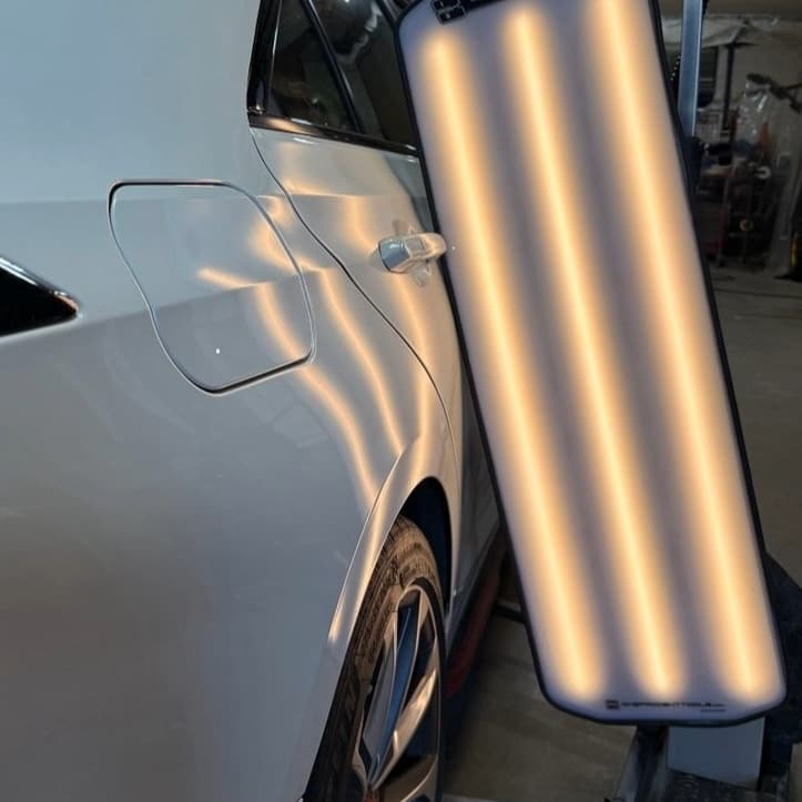 Door dent before repair